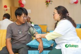 Staff checking blood pressure of customer-daisynepal.com